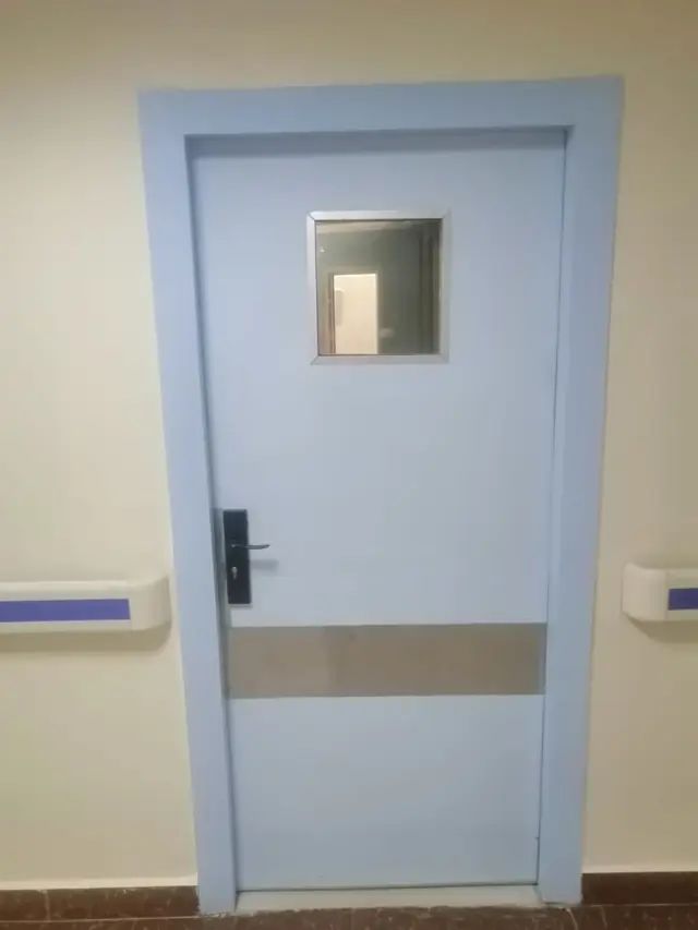 Single door with vision panel and kick plate
