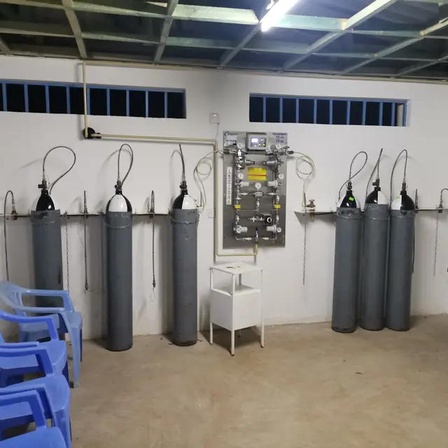 Manifold room with oxygen cylinder banks