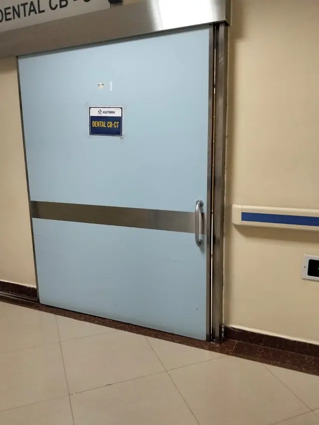 Sliding door to an imaging room