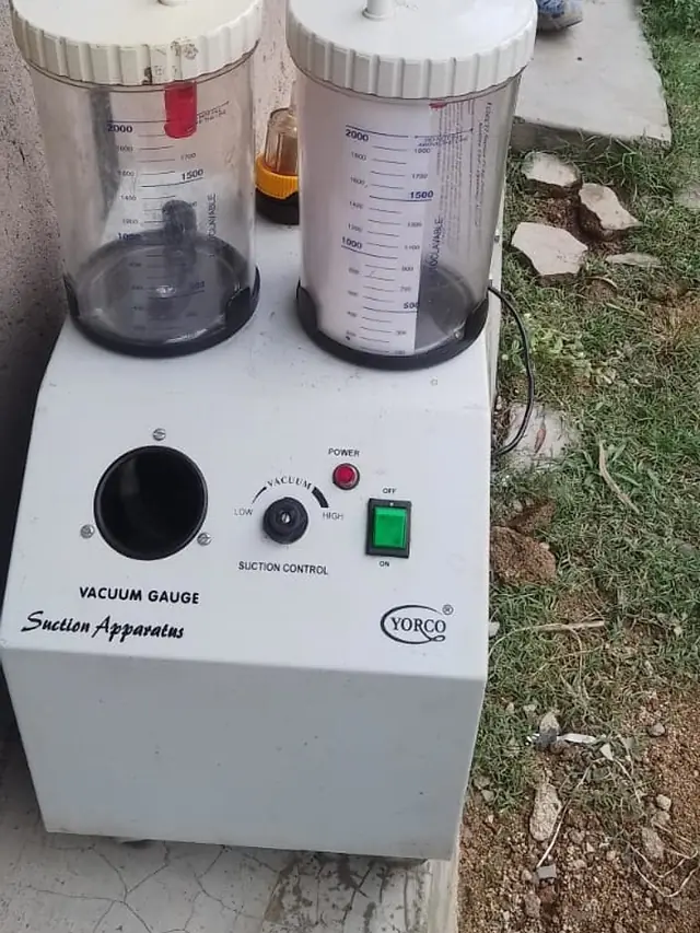 Twin-jar suction machine